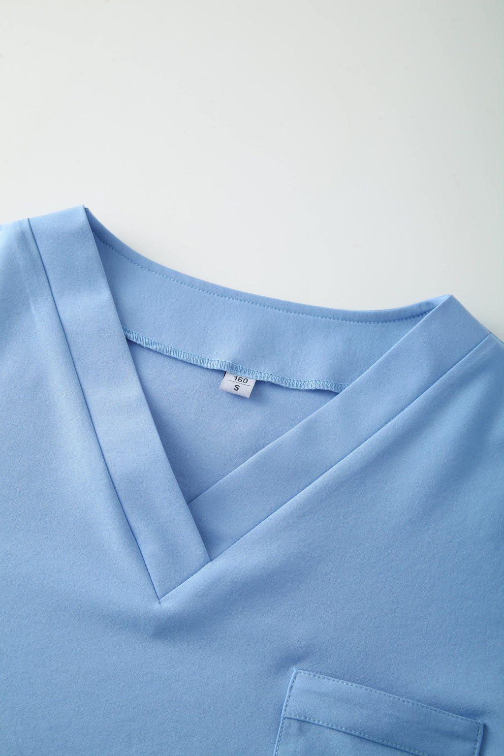 Light Blue Short Sleeves V-neck Healthcare Nurse Uniforms STM5006